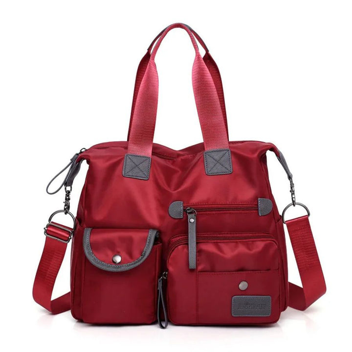 Petit sac bandoulière de voyage femme rouge