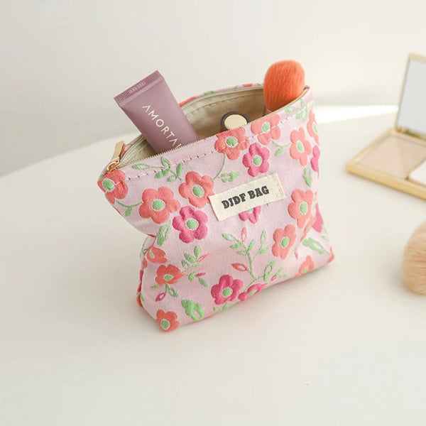 Petite trousse à maquillage fleurie - rose