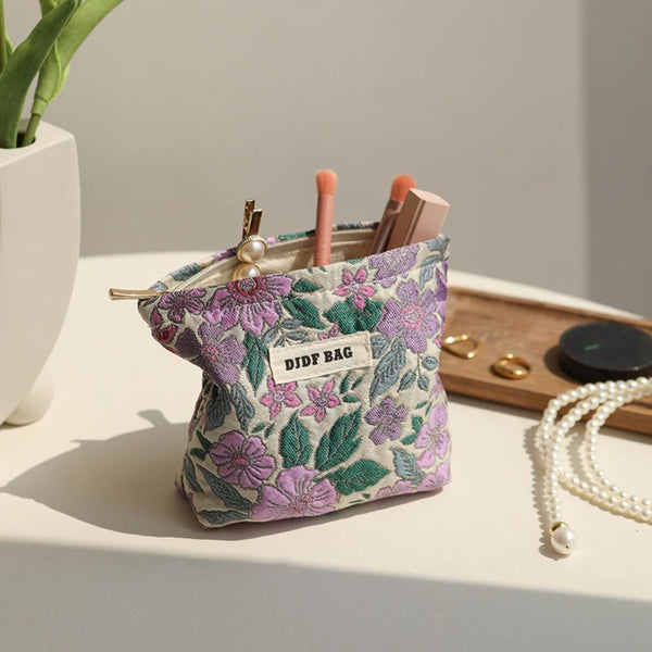 Petite trousse à maquillage fleurie - violet