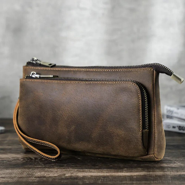 Pochette à main <br> pour homme en cuir café