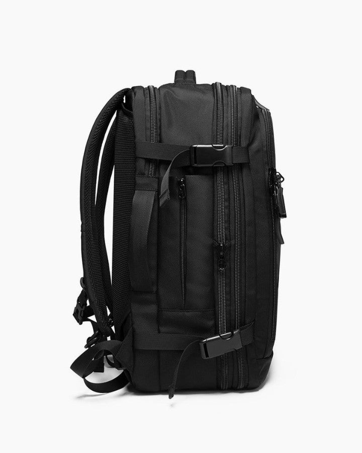 Sac à Dos 55 x 35 x 25 cm - Format Bagage Cabine -  vue de côté, avec poignée type valise et sangles de maintien/compression
