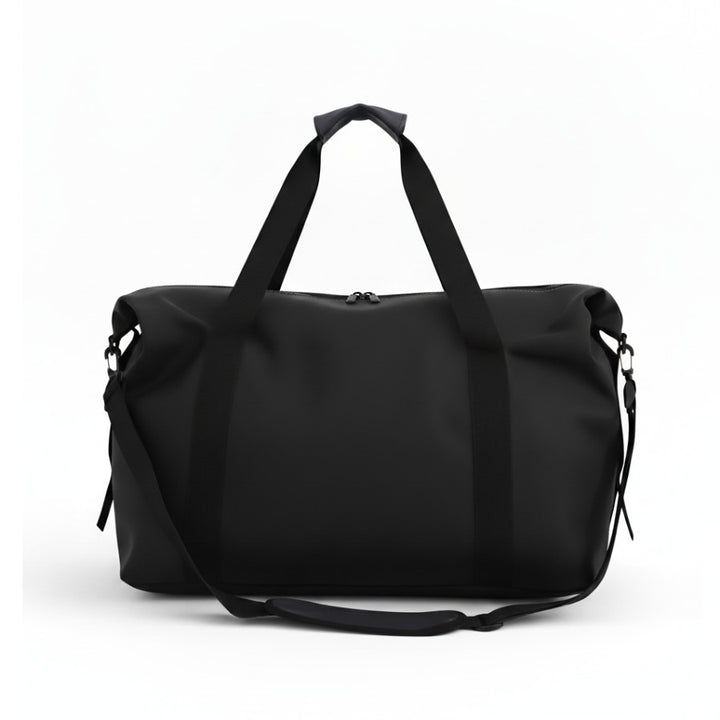 Sac fourre tout de voyage noir au design minimaliste, capacité généreuse pour vêtements et accessoires.