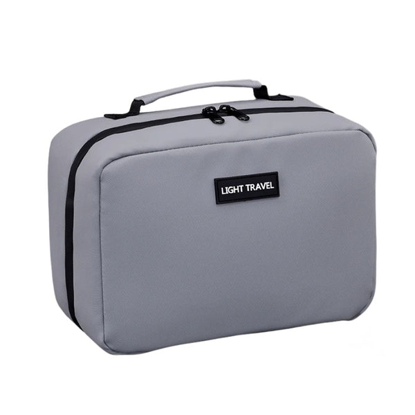 trousse de toilette grise pour homme pratique et spacieuse pour le voyage