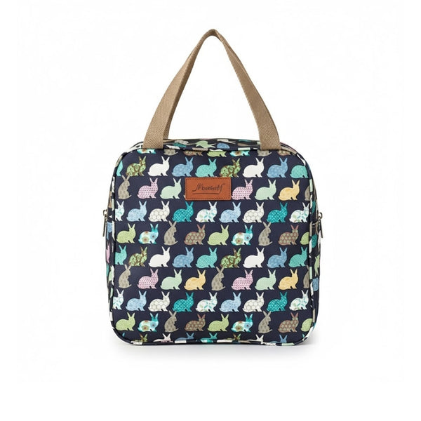 Vanity Lapin - Format Souple de Voyage, motifs imprimés de lapins colorés sur fond bleu marine