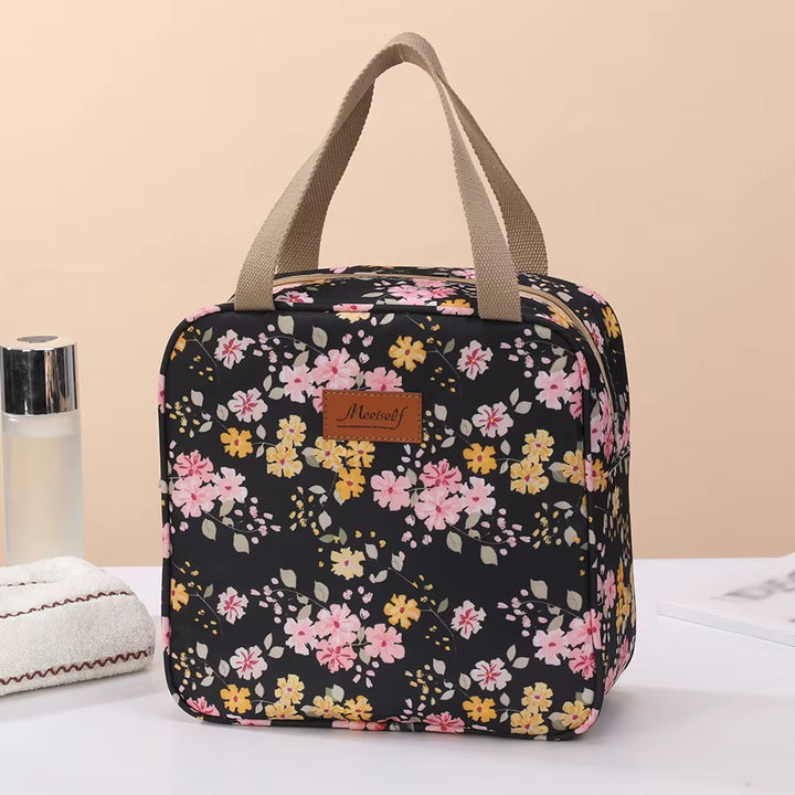 Vanity Motifs Japonais Sakura noir à fleurs de cerisier roses et jaunes, anses beiges renforcées.