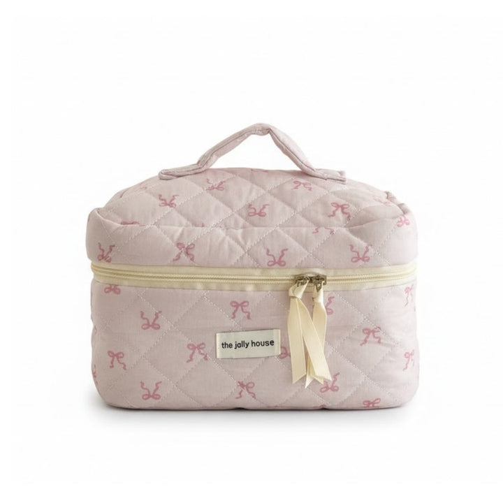 Vanity Rose Pâle matelassé motif nœuds, accessoire de voyage et trousse beauté